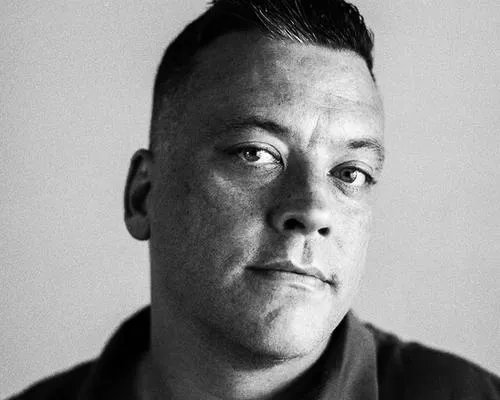 John J. Lennon headshot.