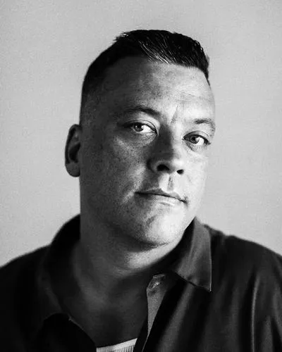 John J. Lennon headshot.